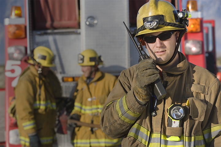 Tile|Group of firefighters on-scene communicating with each other