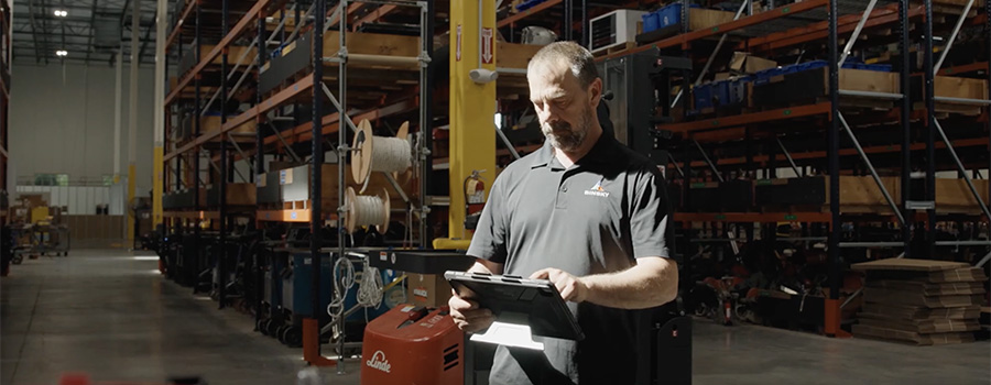 Full|man using a tablet in warehouse.jpg