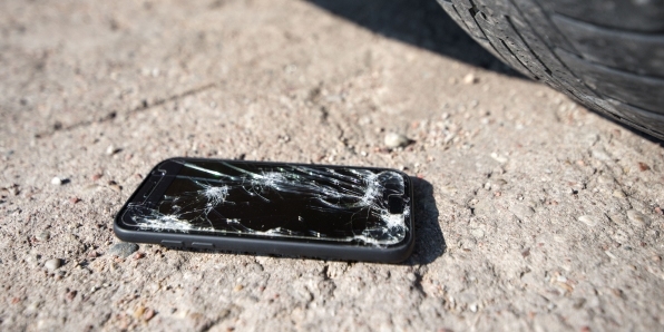 Tile | Broken phone on the ground