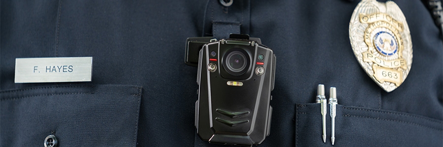 Full|Body camera worn by a police officer in uniform