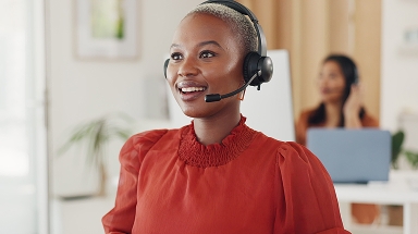Card | Woman wearing headset