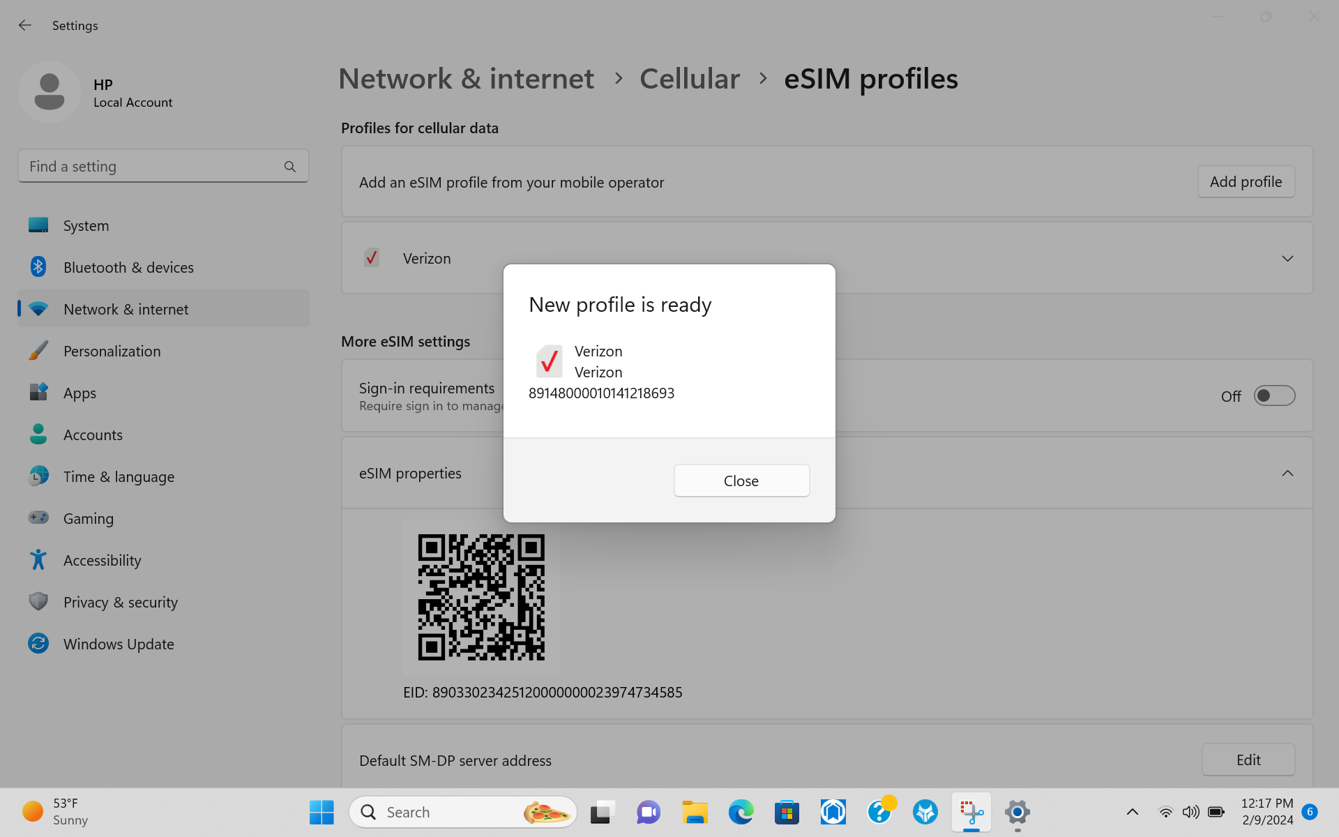 Wide | Windows 11 settings dialog showing new Verizon eSIM profile ready