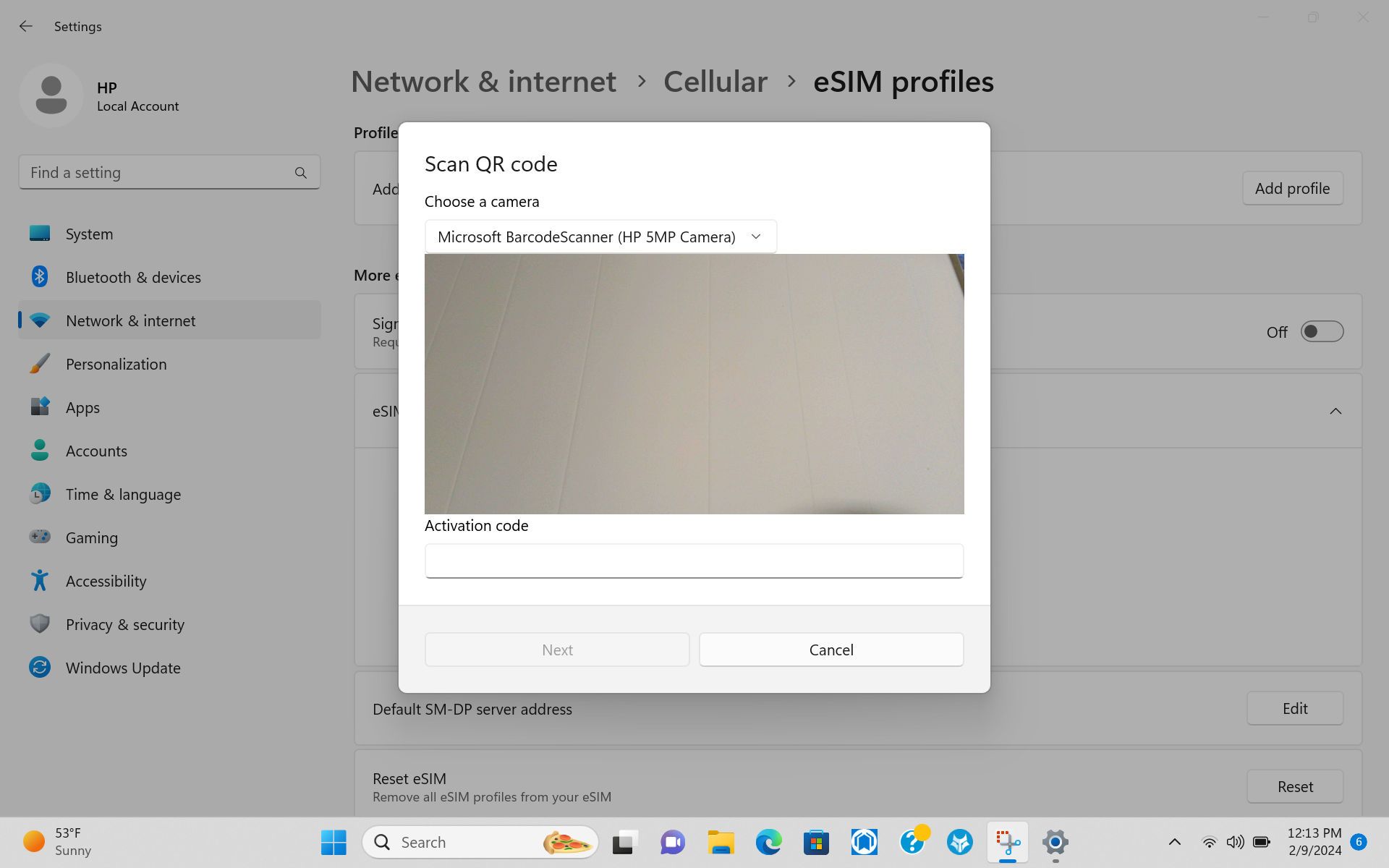 Wide | Windows 11 settings dialog to scan an eSIM QR code