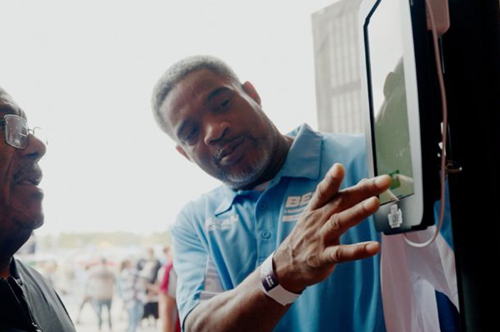 Tile|Two men using tablet