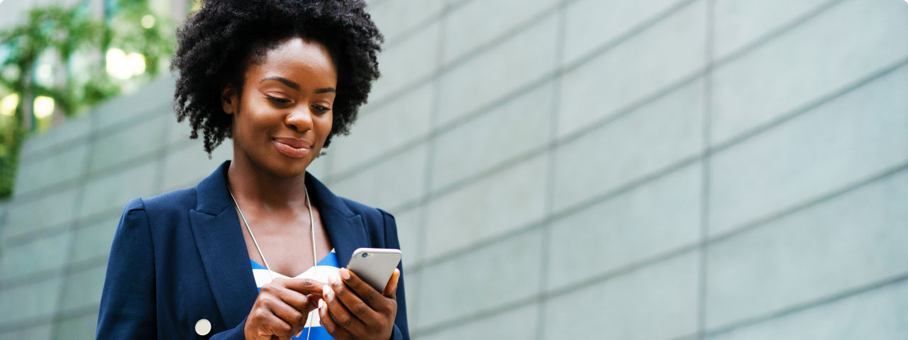 Full|woman using smart phone outside.jpg